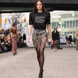 Look 24: BB Classic Graphic T-Shirt + Chain Detail Mini Skirt
